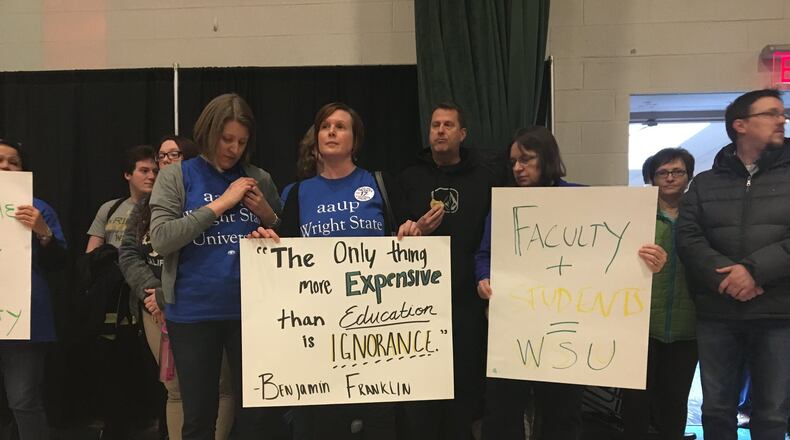 Members of Wright State University’s faculty union rallied and marched on Wednesday to protest a contract proposed by the administration. Faculty members are threatening to strike if a deal on a contract is not reached.