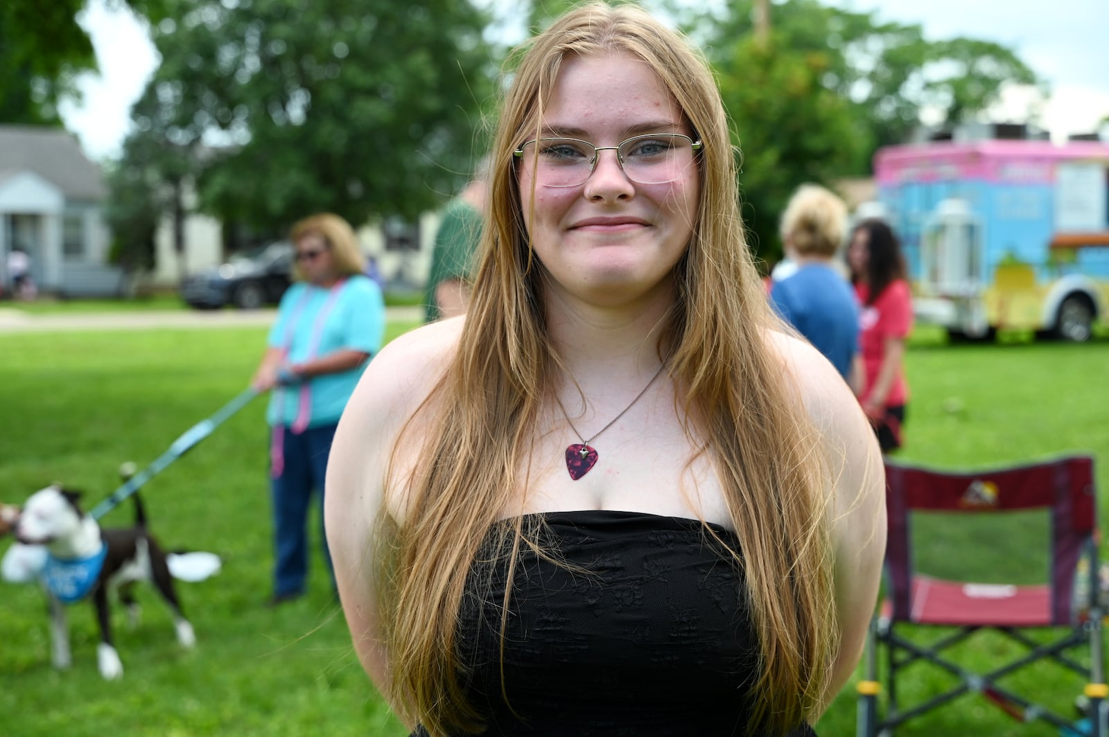 Mina Hoskins. 16. of Hamilton, hosted an inaugural event, Hounds for Heroes, on Saturday, June, 26, 2025, to help improve mental health within the veterans community, raise awareness of rising suicide rates among the veteran community, and connect veterans with dogs at the Animal Friends Humane Society. This inaugural event was held at Benninghofen Park in Lindenwald and was financially supported by a 17Strong microgrant and funding from Envision Partnerships. MICHAEL D. PITMAN/STAFF