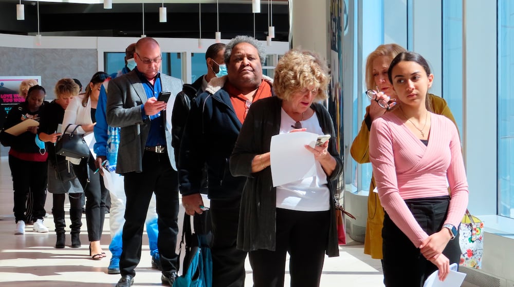 FILE - Applicants line up at a job fair at the Ocean Casino Resort in Atlantic City N.J., on April 11, 2022. (AP Photo/Wayne Parry, File)