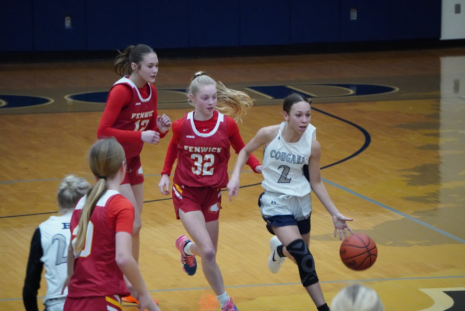 Edgewood’s Breanna Leal (2) dribbles the ball up court as Fenwick’s Haven Keyes trails close behind on defense during their game on Thursday at Ron Kash Court. CHRIS VOGT / CONTRIBUTED