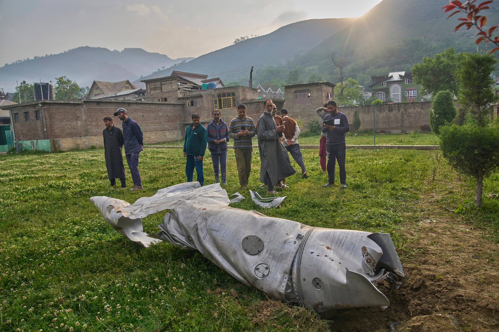 FILE - Debris of an aircraft lie in the compound of a mosque at Pampore in Pulwama district of Indian controlled Kashmir, Wednesday, May 7, 2025. (AP Photo/Dar Yasin, File)