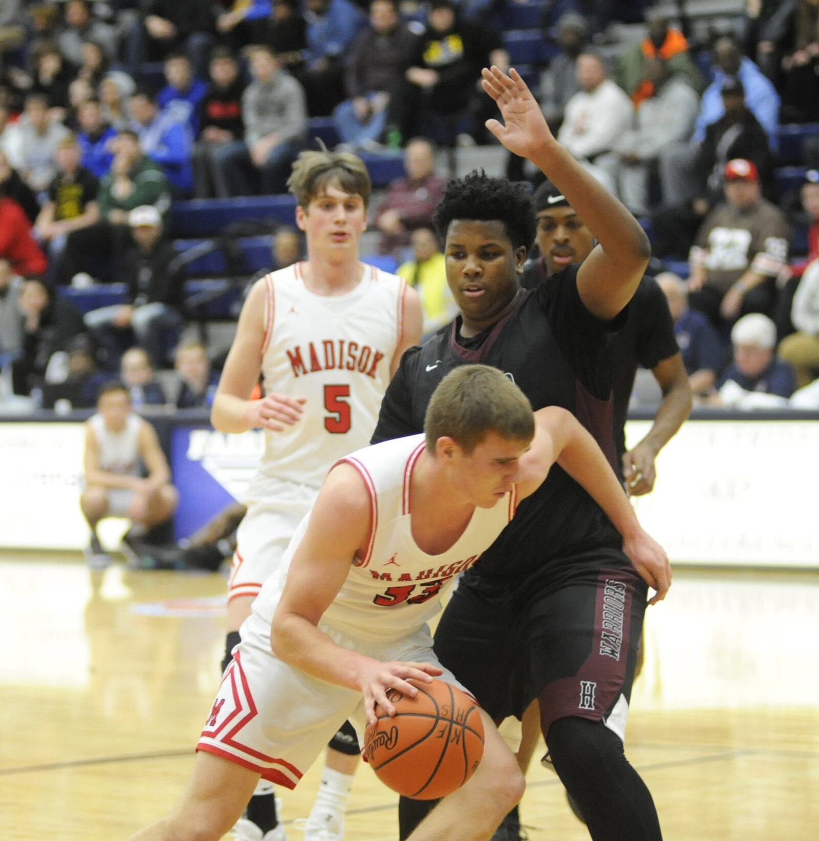 Madison’s Levi McMonigle tries to dribble around Elijah Glenn of Canal Winchester Harvest Prep during Monday night’s Flyin’ to the Hoop at Fairmont’s Trent Arena. Harvest Prep won 79-56. MARC PENDLETON/STAFF