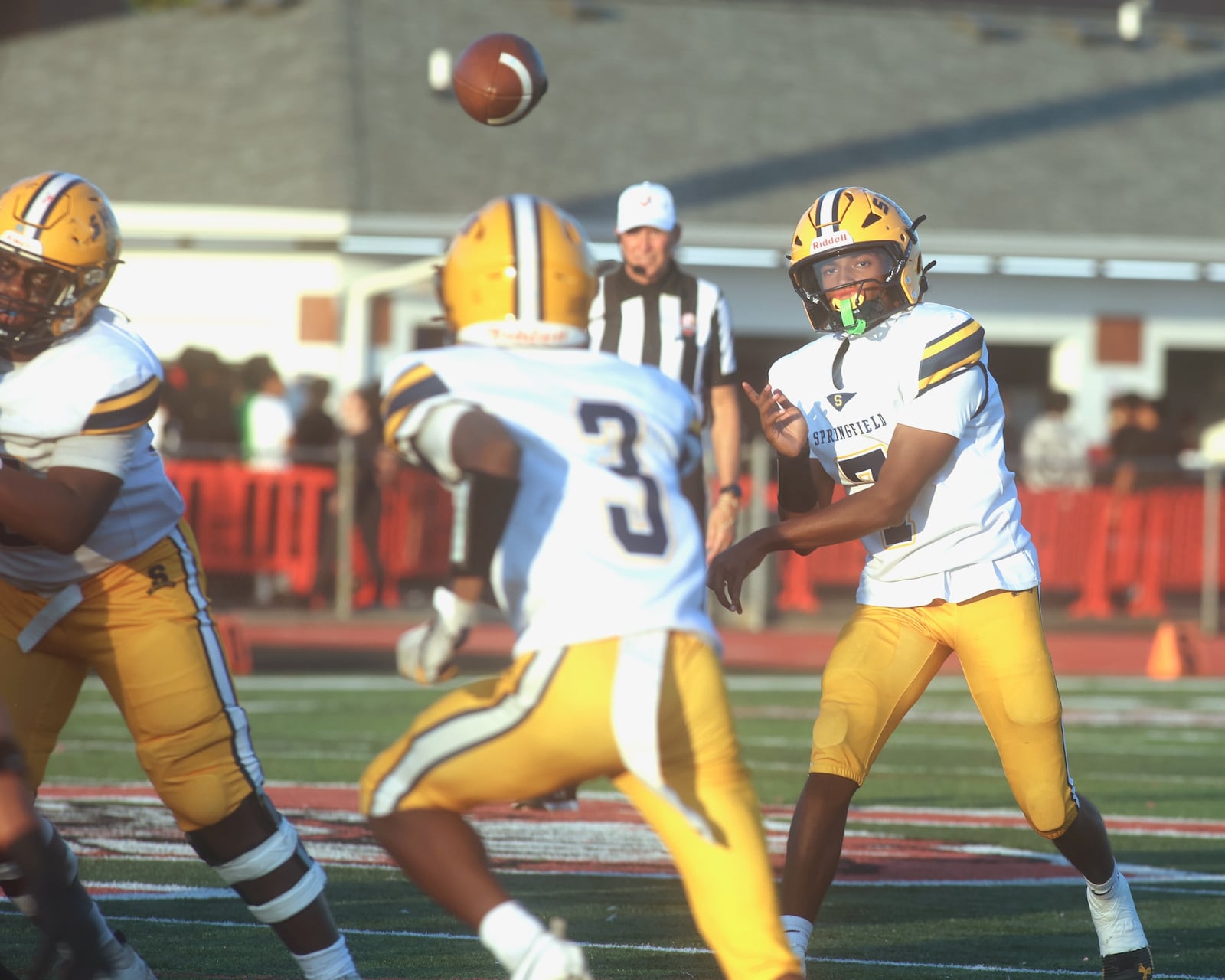 Springfield's Christopher Wallace throws a pass against Wayne on Friday, Oct. 3, 2025, at Heidkamp Stadium in Huber Heights. David Jablonski/Staff