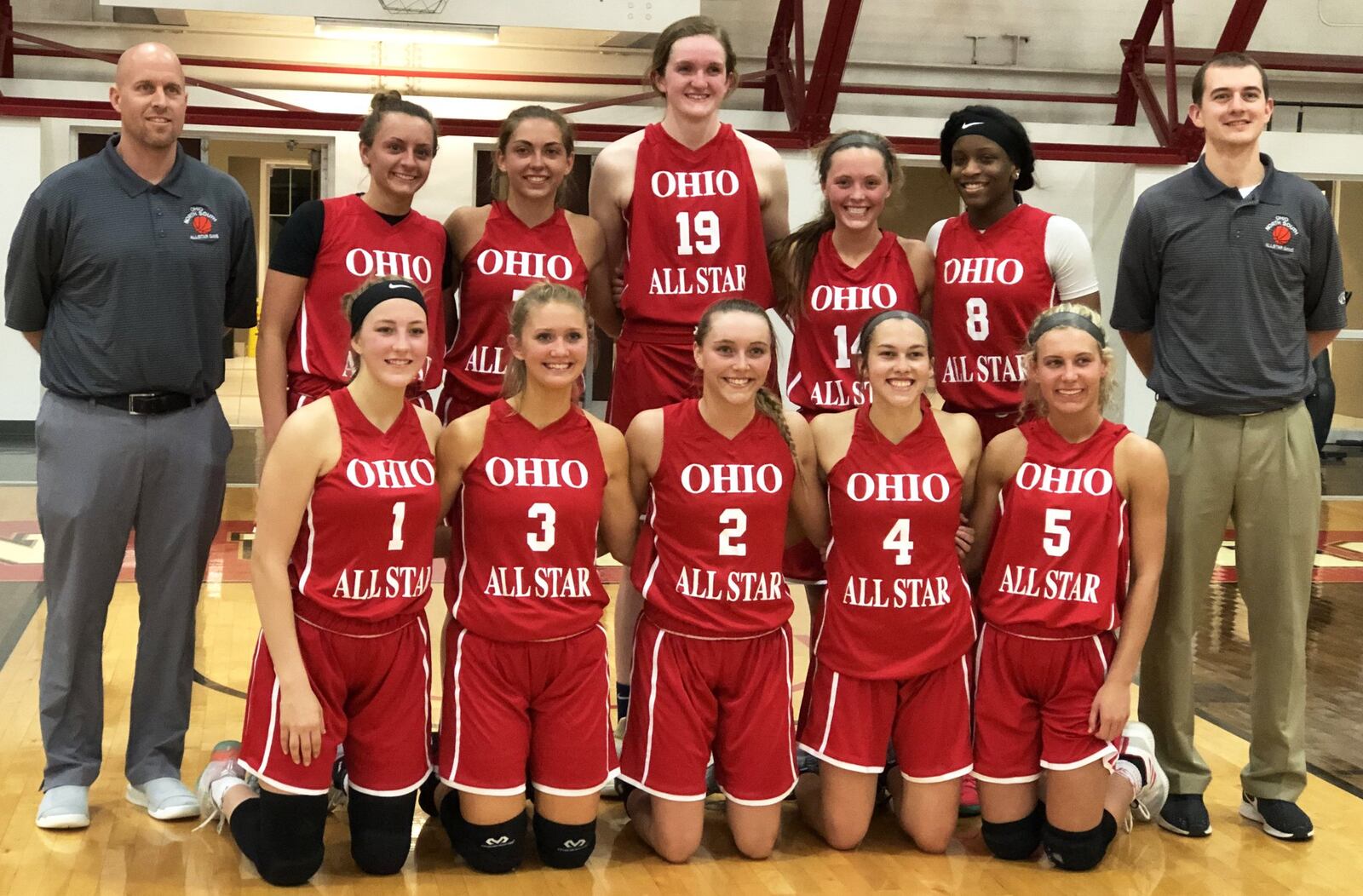 The South defeated the North 72-70 in the Ohio High School Basketball Coaches Association North-South Division III-IV All-Star Game on Friday night at Denison University’s Mitchell Center. The South’s team photo includes (front row, from left) Mallory Garbe of Columbus Tree of Life (1), Rachel Richardson of Albany Alexander (3), Alyssa Evans of Amanda-Clearcreek (2), Peyton Scott of Lynchburg-Clay (4), Lauren Flannery of Hannibal River (5) and (back row, left to right) coach Brad Gray of Tri-Village, Morgan Haney of Miami East (9), Samantha Whiteman of Covington (7), Katie Dettwiller of Portsmouth Notre Dame (19), Rachel Murray of Waynesville (14), Amil Ali-Shakir of Purcell Marian (8) and coach Andy Timmerman of Russia. RICK CASSANO/STAFF