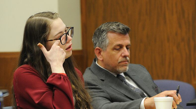 Abby Michaels, left, wipes away tears during the last day of her trial in Montgomery County Common Pleas Court on Thursday, June 8, 2023. Sitting next to her is defense attorney, Anthony Cicero. MARSHALL GORBY\STAFF