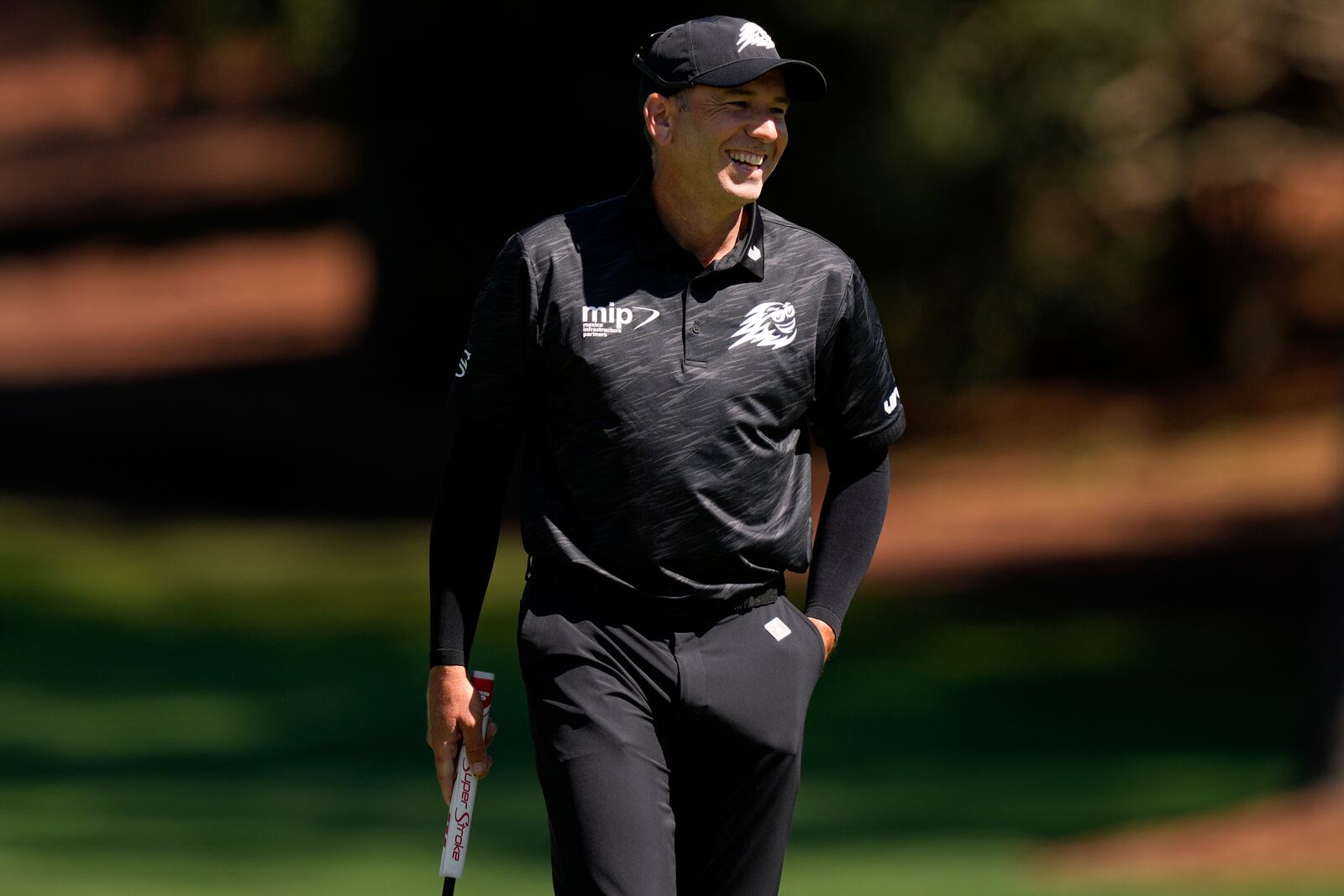 Sergio Garcia, of Spain, smiles on the 10th green during a practice round at the Masters golf tournament, Tuesday, April 8, 2025, in Augusta, Ga. (AP Photo/Matt Slocum)