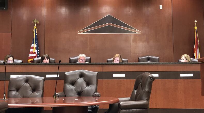 With three members absent, Springboro City Council voted 4-0 on Thursday to accept a new 20-year deal with Clearcreek Twp. that involves annexations, the fire department and funding. STAFF/LAWRENCE BUDD