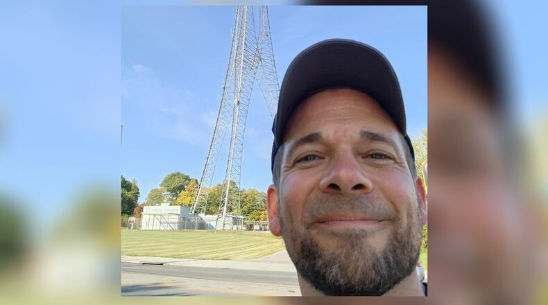 Eric Judd, of Fairfield, is pictured on Tuesday, Oct. 11, 2022, walking to Great American Ball Park from his Butler County home. He’s making the 20-plus-mile journey to raise money for the Joe Nuxhall Miracle League Fields. He’s expected to get to the Reds home stadium at 2:30 p.m. Tuesday. CONTRIBUTED