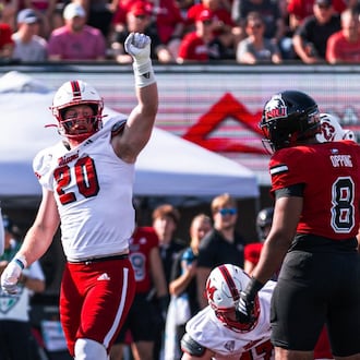 Miami's Adam Trick celebrates a tackle against Northern Illinois on Saturday in DeKalb, Ill. The RedHawks opened Mid-American Conference play with a 25-14 victory. MIAMI ATHLETICS PHOTO