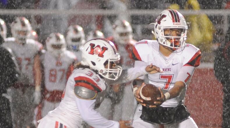 Wayne RB Trace Kinnel and QB Rashad McKee during a 14-7 Week 10 loss to visiting Trotwood-Madison last season. Wayne’s season opener is Friday, Aug. 24 against visiting Austin-East Magnet of Knoxville, Tenn. MARC PENDLETON / STAFF