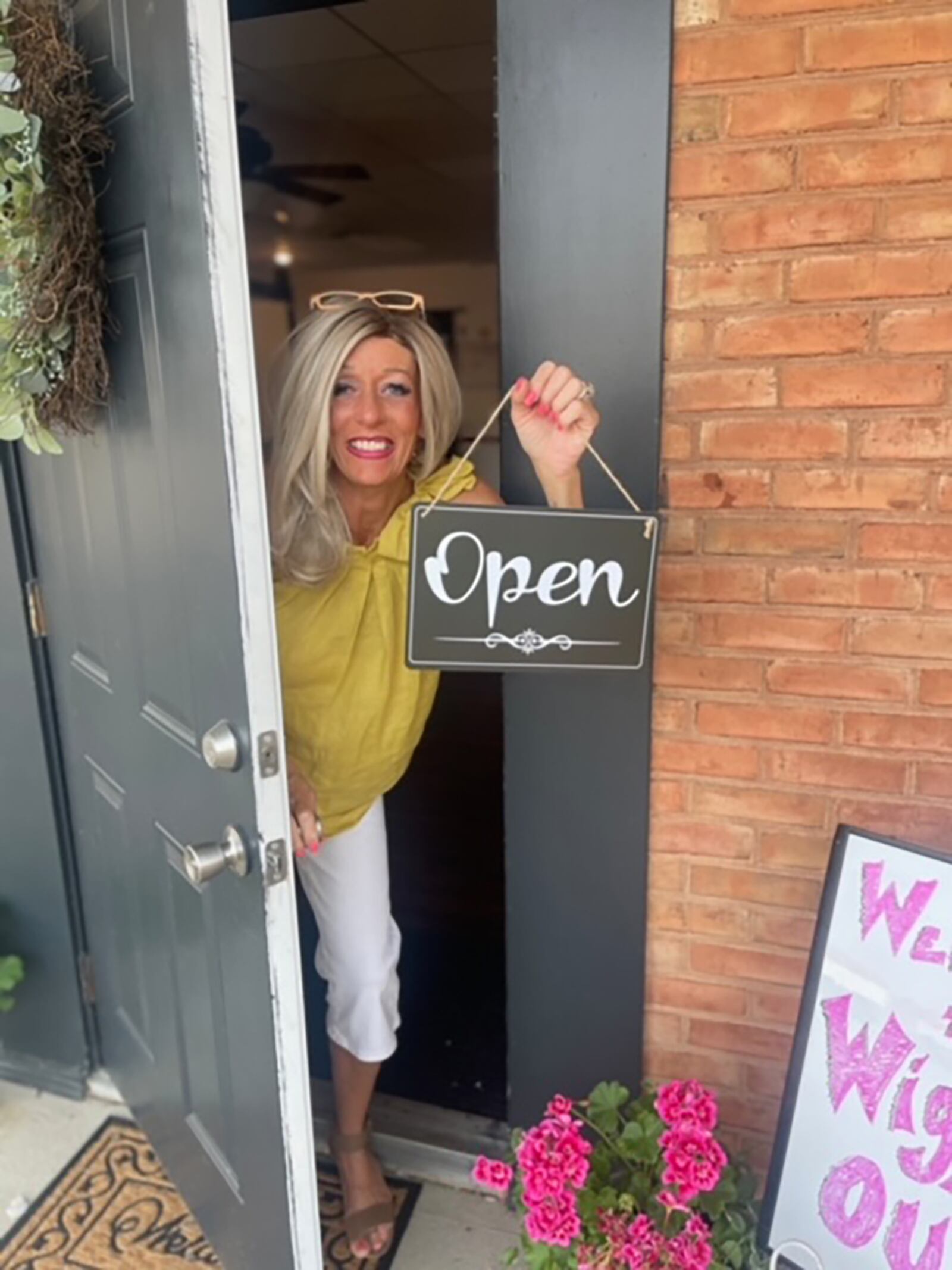 Carrie Kendall on opening day of her new boutique, "Wigging Out," June 7, 2023. CONTRIBUTED