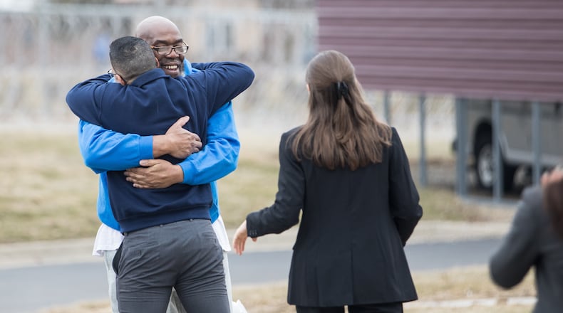 George Calicut Jr. meets his legal team at a prison in Coldwater, Mich., on March 3, 2026, after a judge threw out his 1999 murder conviction and life prison sentence. (Dustin Johnston/University of Michigan Law School via AP)