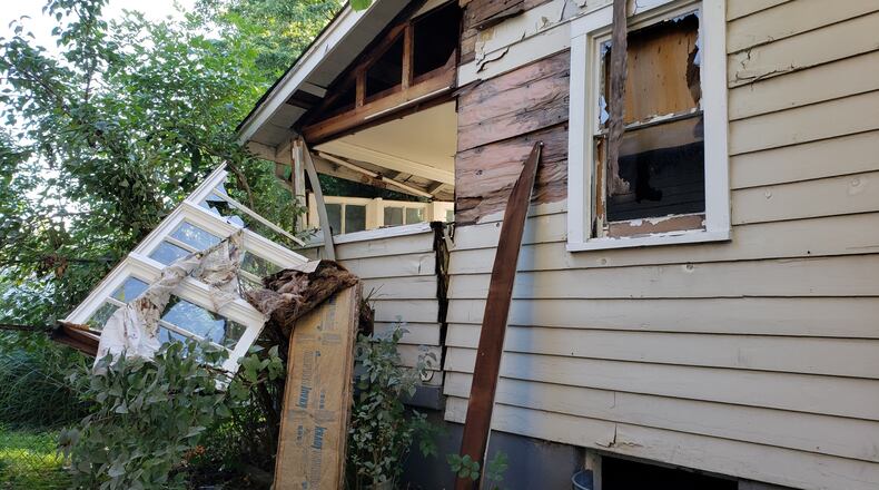 A gas explosion around 4:15 a.m. severely damaged a house in the 600 block of Ross Avenue, but nobody was seriously injured, fire officials said. NICK GRAHAM / STAFF