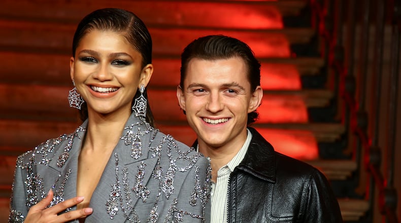 Tom Holland, right, and Zendaya pose for photographers at the photo call for the film 'Spider-Man: No Way Home' in London Sunday, Dec. 5, 2021. (Photo by Joel C Ryan/Invision/AP)