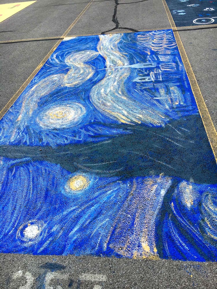 PHOTOS Lakota East seniors paint parking spots