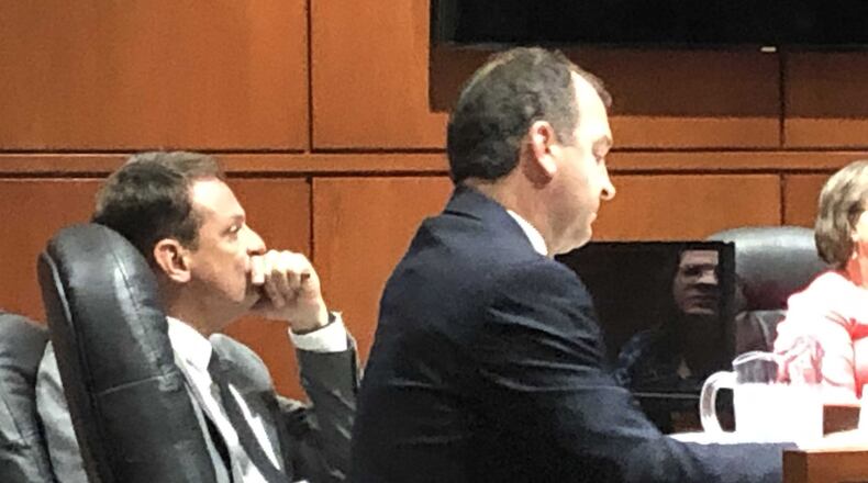 Lawyer Jon Paul Rion and John Hinkle (left) during Monday’s trial in Warren County Common Pleas Court. STAFF/LAWRENCE BUDD