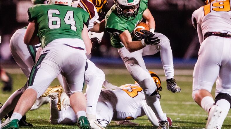 Badin’s Alex DeLong carries the ball during their first round playoff football game against Ross Friday, Nov. 9, 2019 at Hamilton’s Virgil Schwarm Stadium. Badin won 46-14 to advance to the next round. NICK GRAHAM/STAFF