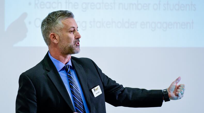 Butler Tech superintendent Jon Graft speaks during the annual higher education seminar Thursday, Nov. 3 at MidUSA Credit Union in Middletown. NICK GRAHAM/STAFF