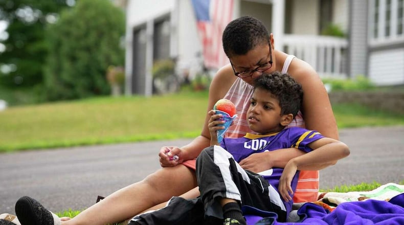 Sheletta Brundidge and her son Daniel, 10. Daniel has autism and was drawn to water; Sheletta said the only thing that has helped are interior combination locks. PROVIDED