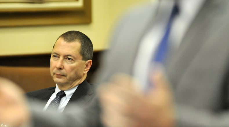 As the plaintiffs in the civil suit against former state lamaker Pete Beck seek donations his campaign made to OHROC, Beck is in the midst of appealing his 2015 13-count criminal conviction. Pictured is Beck listens to cross-examination testimony on May 20, 2015, as his defense attorney Chad Ziepfel, foreground, questions a witness.