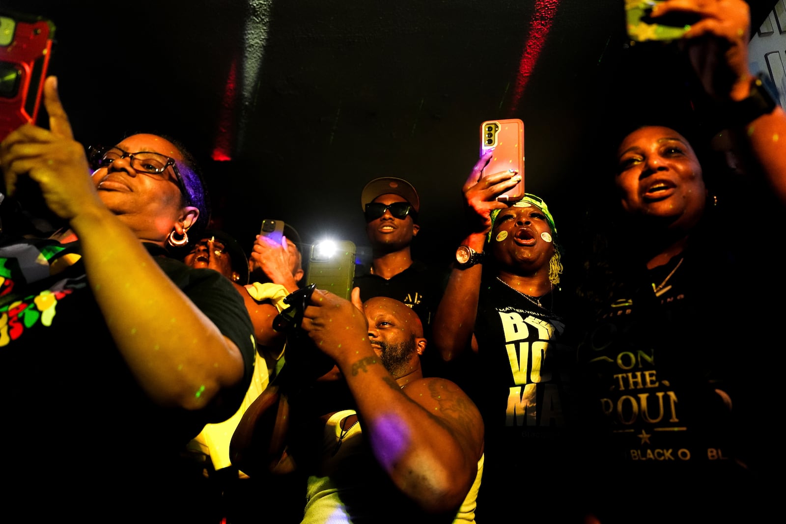 Supporters of District of Columbia councilmember elect Trayon White listen to White speak at his Ward 8 special election watch party, Tuesday, July 15, 2025, in Washington. (AP Photo/Julia Demaree Nikhinson)
