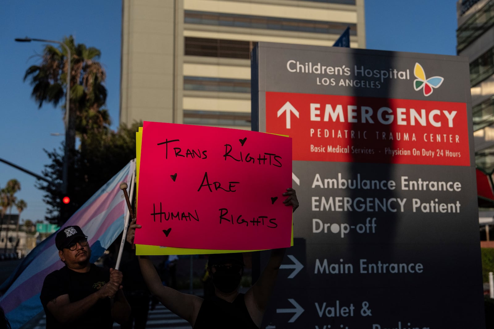 Protesters demonstrate against the planned closure of the trans youth clinic at Children's Hospital Los Angeles, Thursday, July 3, 2025, in Los Angeles. (AP Photo/Jae C. Hong)