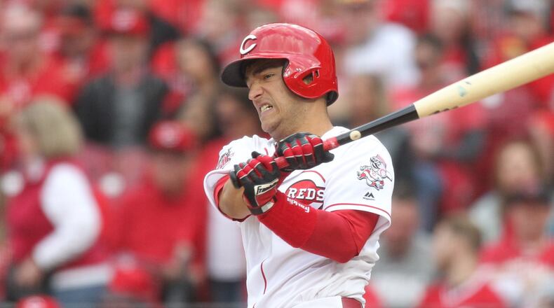 The Reds’ Jose Iglesias doubles in the seventh inning against the Pirates on Opening Day on Thursday, March 28, 2019, at Great American Ball Park in Cincinnati. David Jablonski/Staff