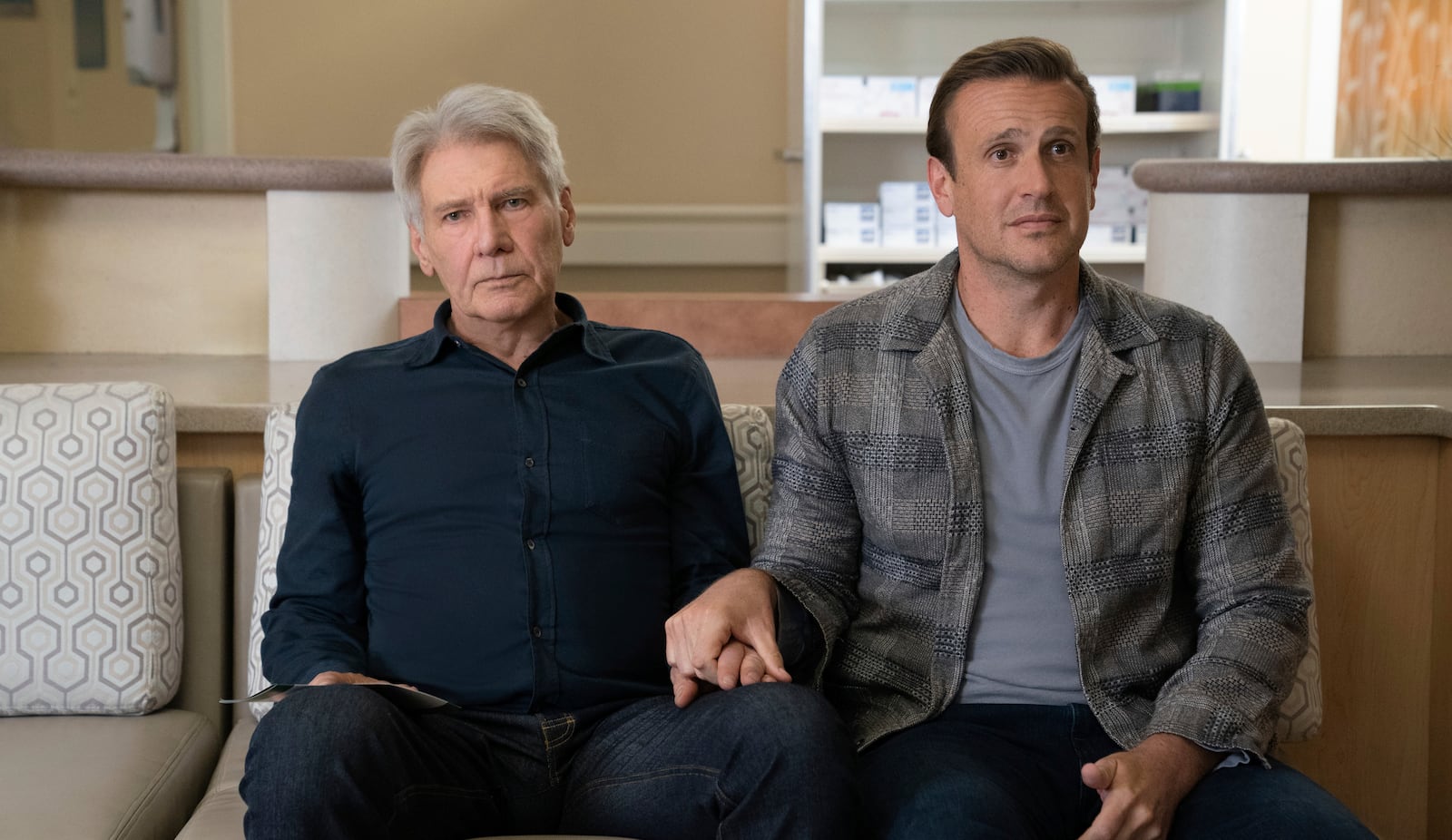 This image released by Apple TV+ shows Harrison Ford, left, and Jason Segel in a scene from "Shrinking." (Beth Dubber/Apple TV+ via AP)