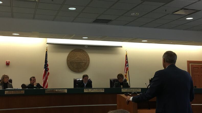 Jon Sams, a trustee in Turtlecreek Twp., urges the Warren County Board of Commissioners to prohibit development of distribution centers on more than 300 acres around the Ohio 123 interchange at Interstate 71. LAWRENCE BUDD/STAFF