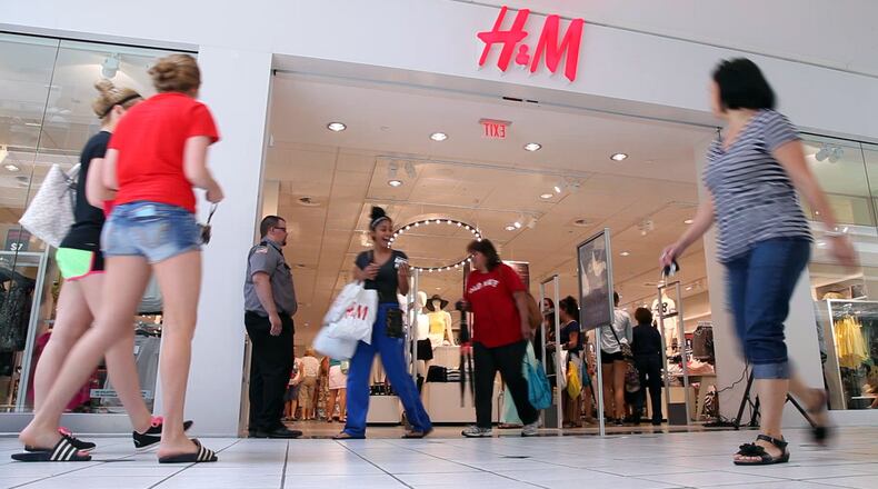 H&M is one of several stores planning to close on Thanksgiving. TY GREENLEES / STAFF