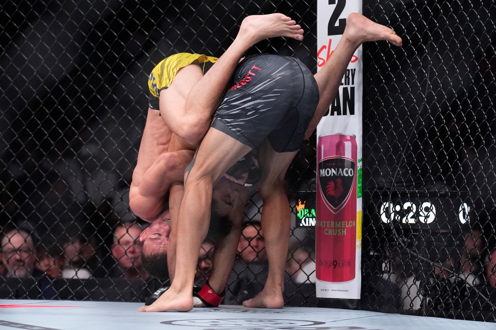Payton Talbott, right, fights Felipe Lima in a bantamweight fight at UFC 317, Saturday, June 28, 2025, in Las Vegas. (AP Photo/John Locher)