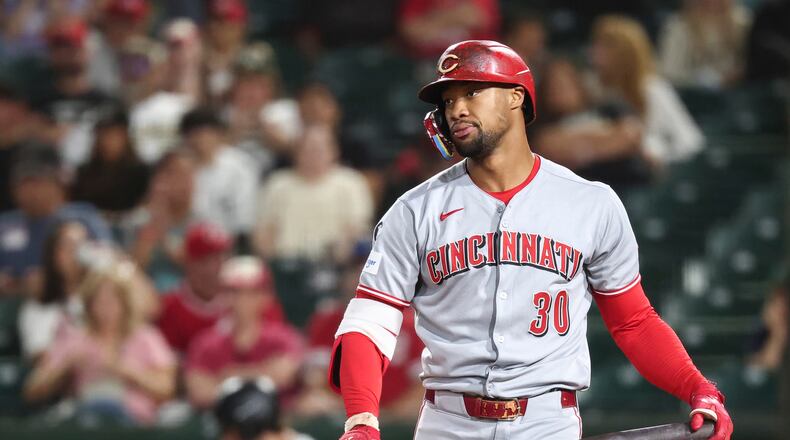 Cincinnati Reds' Will Benson reacts to striking out during the eighth inning of a baseball game against the Athletics Friday, Sept. 12, 2025, in West Sacramento, Calif. (AP Photo/Sara Nevis)