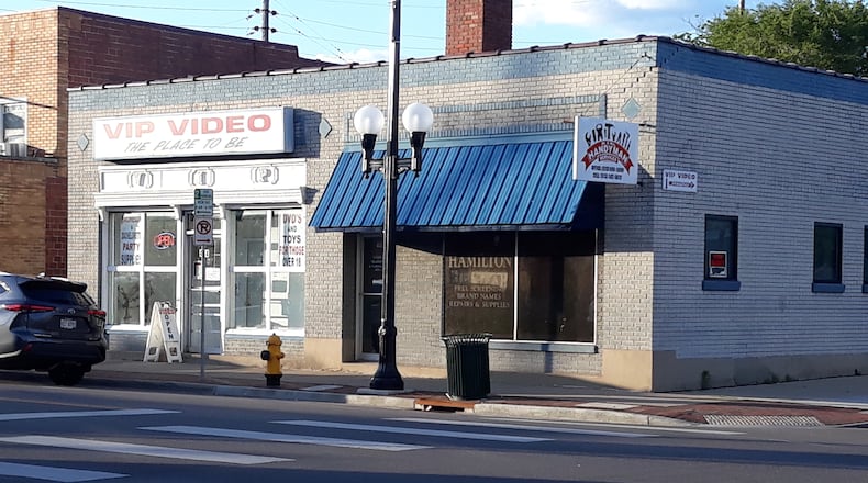 The city of Hamilton is preparing to buy the VIP Video building, and the store will move back to Millville next week. MIKE RUTLEDGE/STAFF