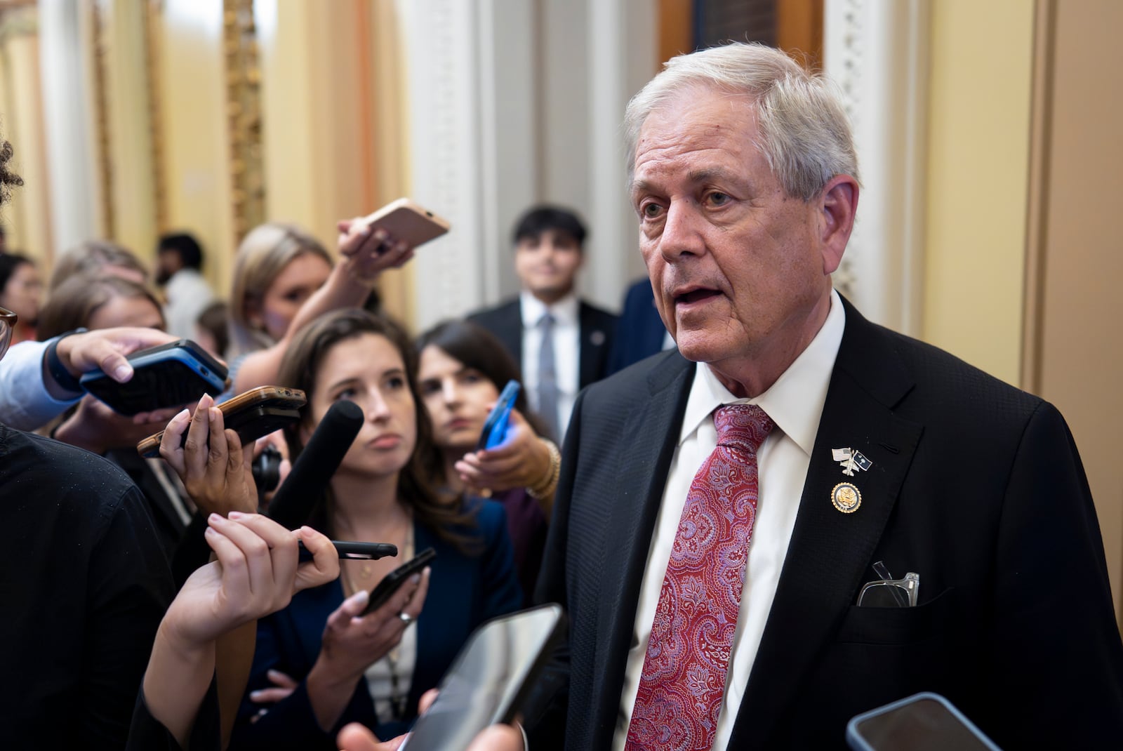 Rep. Ralph Norman, R-S.C., a member of the conservative House Freedom Caucus, speaks to reporters following his White House meeting as Republicans work to push President Donald Trump's signature bill of tax breaks and spending cuts across the finish line even as conservative and moderate GOP holdouts slow that effort, at the Capitol in Washington, Wednesday, July 2, 2025. (AP Photo/J. Scott Applewhite)