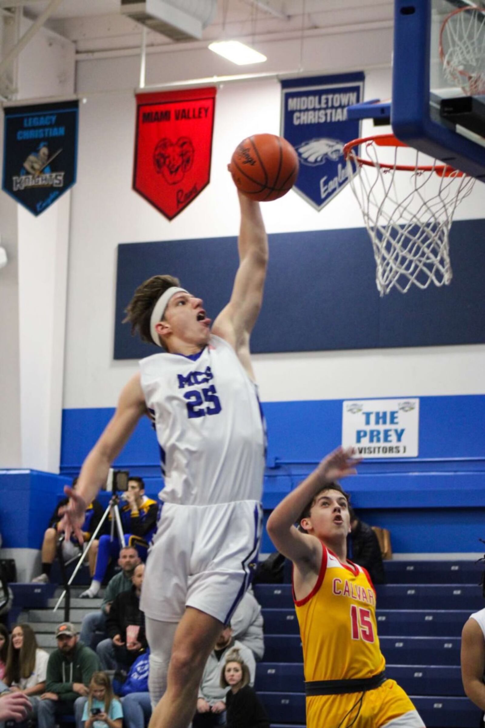 Middletown Christian's Jared Rose dunks during a game this season. Rose became the school's all-time leading scorer as a senior. CONTRIBUTED