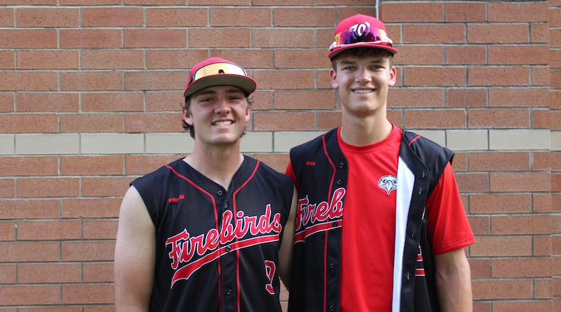 Lakota West seniors Tucker Wilburn and Landon Holt stand together after the Firebirds’ 1-0 victory over Olentangy Liberty at Nischwitz Stadium on Tuesday. JACOB BENGE