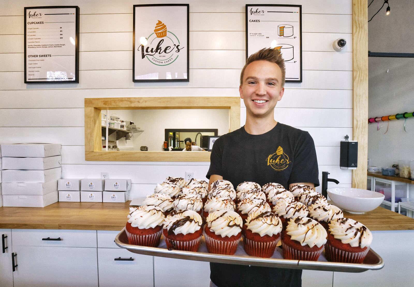 Luke Heizer has opened Luke's Custom Cakes in the former True West Voffee location on High Street in downtown Hamilton. NICK GRAHAM / STAFF