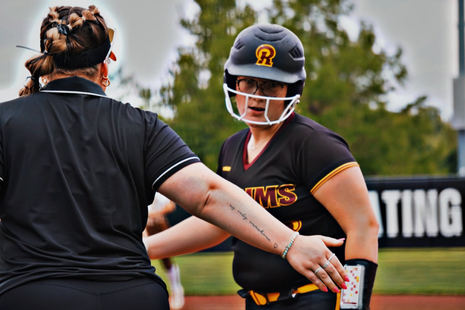 Ross senior Emilee Peters reacts after hitting a single during her Division III regional semifinal game against Western Brown on Wednesday at Miami University. CHRIS VOGT / CONTRIBUTED