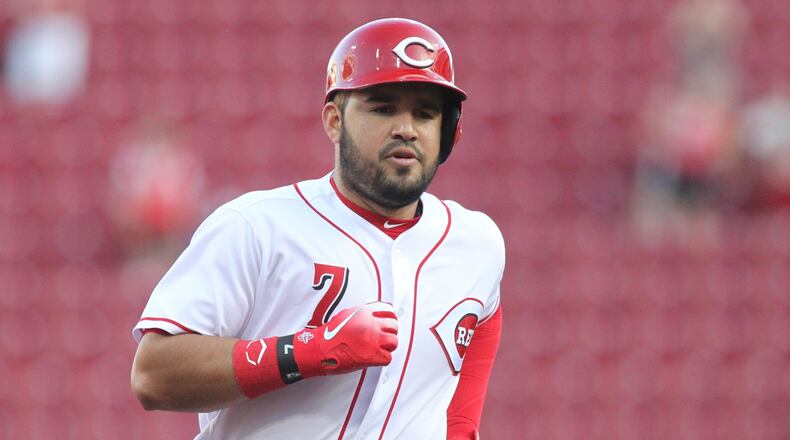 The Reds’ Eugenio Suarez rounds the bases after a home run against the Brewers on Tuesday, May 1, 2018, at Great American Ball Park in Cincinnati. David Jablonski/Staff