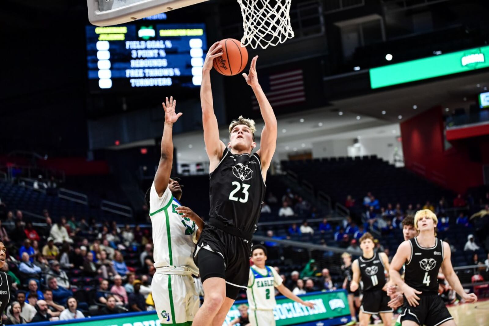 Badin's Aidan Brown (23) puts up a shot during a Division II district final game against Chaminade Julienne on Saturday at UD Arena. Kyle Hendrix/CONTRIBUTED