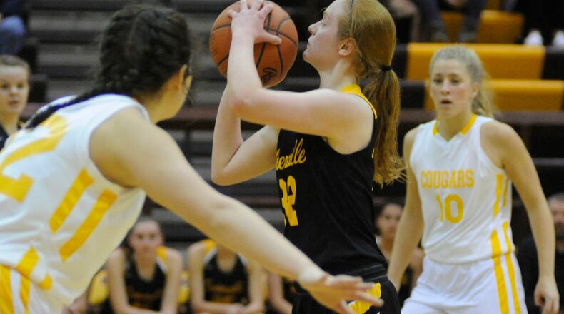 Sam Chable (shooting) is a senior starter for No. 5 (Division I) Centerville. MARC PENDLETON / STAFF