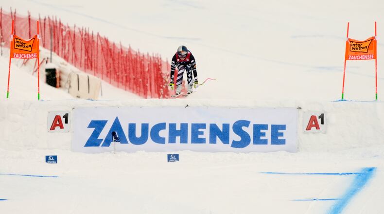 United States' Lindsey Vonn is airborne as she speeds down the course to win an alpine ski, women's World Cup downhill, in Zauchensee, Austria, Saturday, Jan. 10, 2026. (AP Photo/Giovanni Auletta)