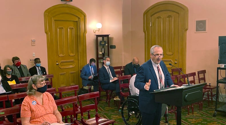 In this Sept. 23, 2021 photo, Tim Young, Ohio's State Public Defender, testifies at the Ohio Statehouse in Columbus in favor of a bill that would abolish capital punishment in Ohio. Young also pushed for a measure that became law earlier this year, and which prohibits inmates from being executed if they suffered from a serious mental illness at the time of their crime, including schizophrenia, or bipolar disorder. (AP Photo/Andrew Welsh-Huggins)