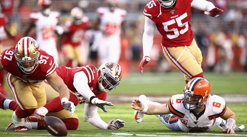 SANTA CLARA, CALIFORNIA - OCTOBER 07: Quarterback Baker Mayfield #6 of the Cleveland Browns fumbles as he is the ball is pursued by Nick Bosa #97 of the San Francisco 49ers during the game at Levi’s Stadium on October 07, 2019 in Santa Clara, California. (Photo by Ezra Shaw/Getty Images)