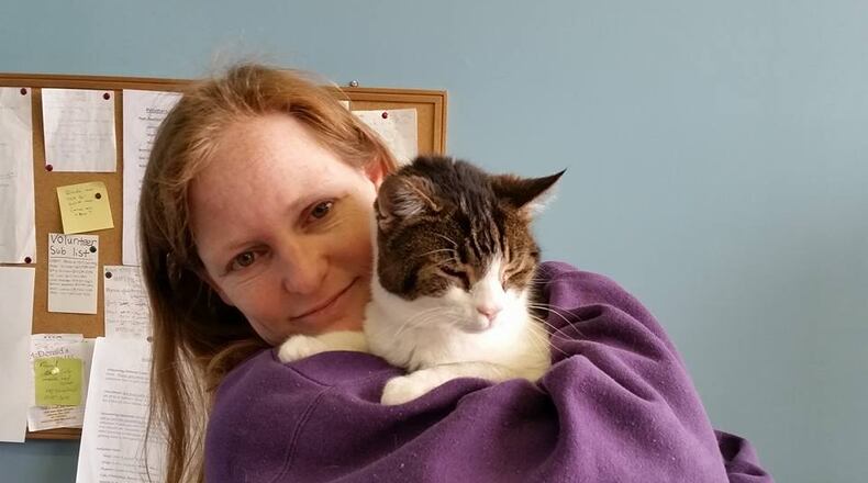 Robyn McGeorge holds 18-year-old Robyn’s Nest resident Georgie, who came to Robyn’s Nest at 13, wasn’t adopted and decided to stay. CONTRIBUTED