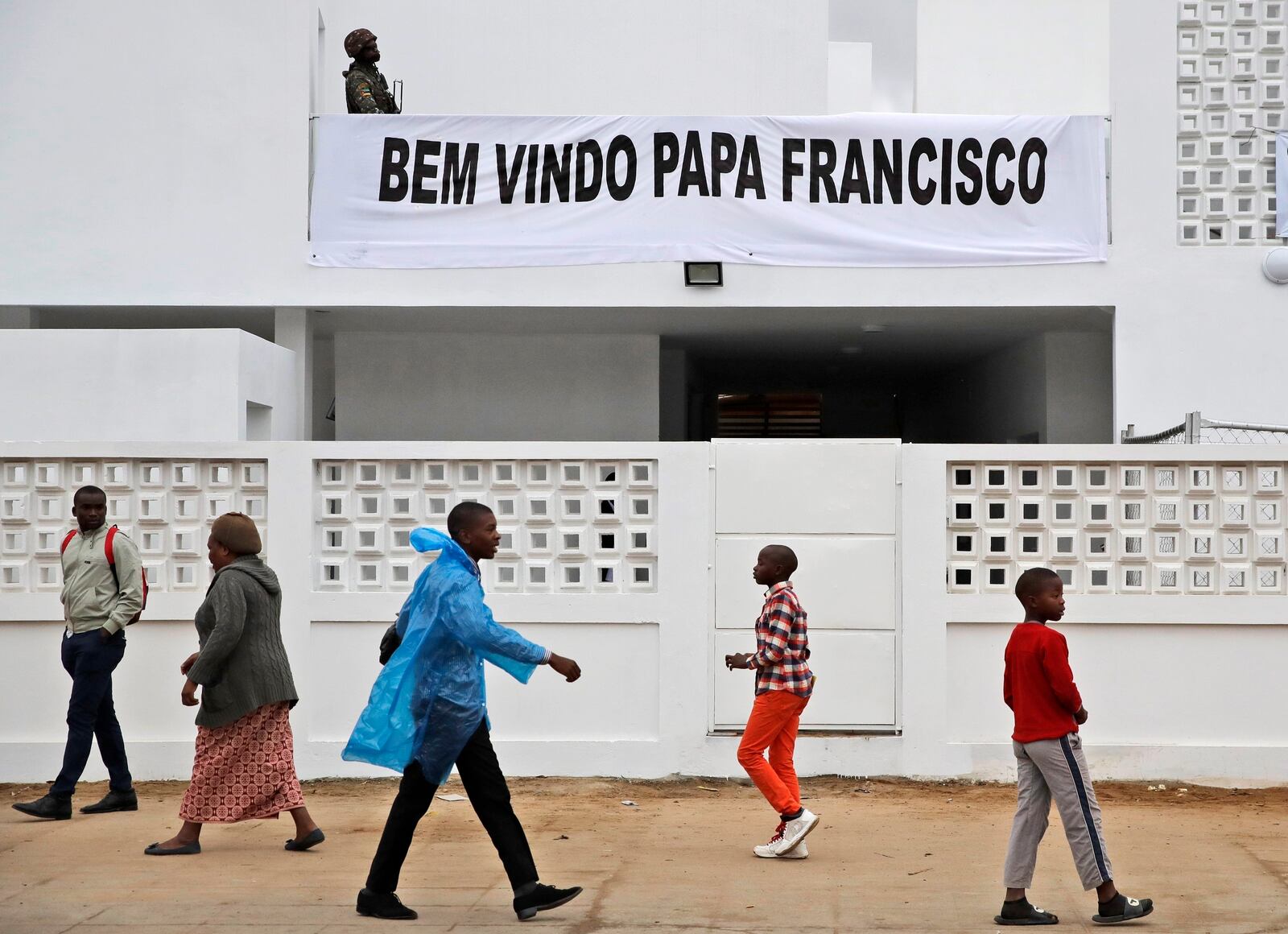 FILE - An armed soldier stands on a balcony at Zimpeto Hospital before Pope Francis' visit in Maputo, Mozambique, Sept. 6, 2019. (AP Photo/Alessandra Tarantino, File)