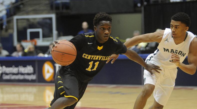 Mason’s boys basketball team finished second in the GMC before knocking off Centervville 44-38 in a Division I district final at UD Arena in March. MARC PENDLETON / STAFF