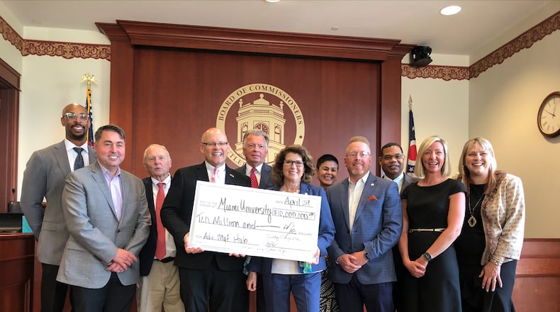 Butler County Commission on Monday, April 29, 2024, increased its financial commitment to the Butler County Advanced Manufacturing Innovation Hub planned for the Vora Technology Park on Knightsbridge Drive in Hamilton. The increase is because the city of Hamilton released its Butler County ARPA funds to go toward the multi-jurisdictional project among Miami University, which will purchase Vora Technology Park, Butler Tech, the city of Hamilton and the Butler County Commission. Pictured are officials representing the multiple organizations involved at the April 29, 2024, Butler County Commission meeting. PROVIDED