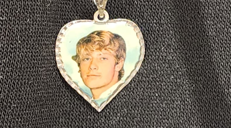 Christina Schindler wears a locket of her 21-year-old son, Jayden Stephenson, who had mental health issues. Stephenson was shot by Miami Twp. police Feb. 19 after they responded to a call for him wielding a knife. ERIC SCHWARTZBERG/STAFF