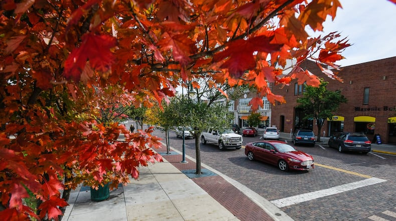 The fall colors pop along High Street on Oct. 26 in Oxford. The city has been named one of Ohio’s “Best Hometowns” in the November issue of Ohio Magazine. NICK GRAHAM/STAFF